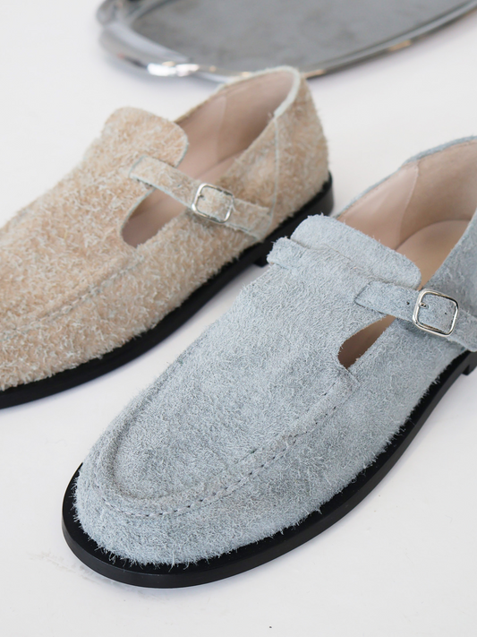 Two flat mary-jane shoes in brushed suede in grey and sand colours
