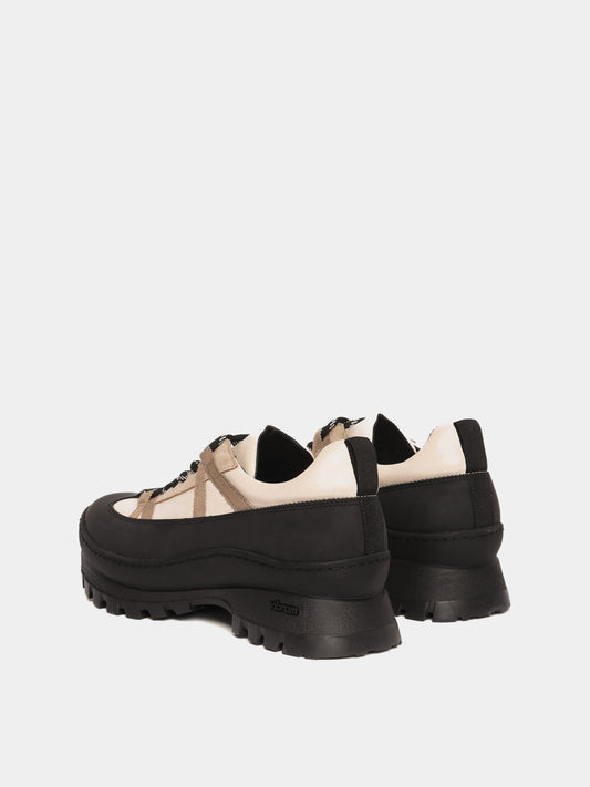 Beja beige combo sneaker with Vibram anti-slip outsole and rubber trim, back view.