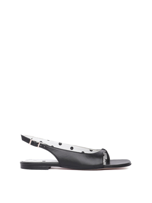 Flat black sandal with white polka dot lining