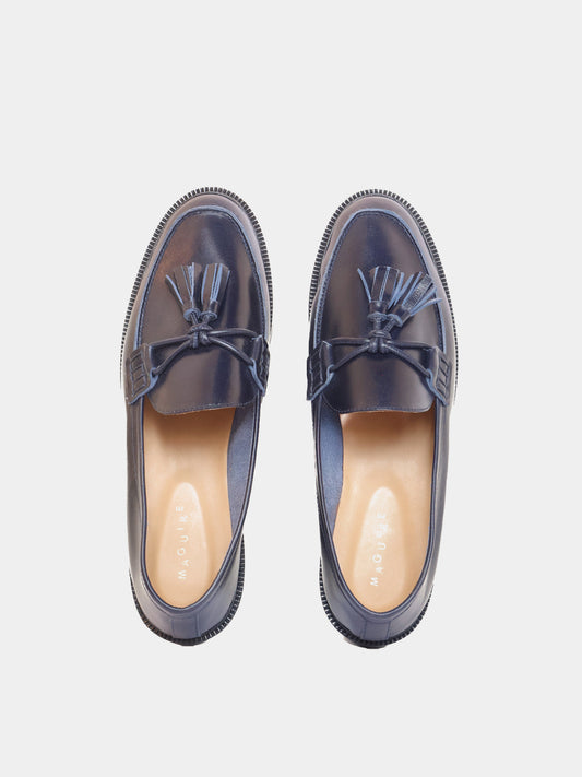 Navy loafer with pompom, top view
