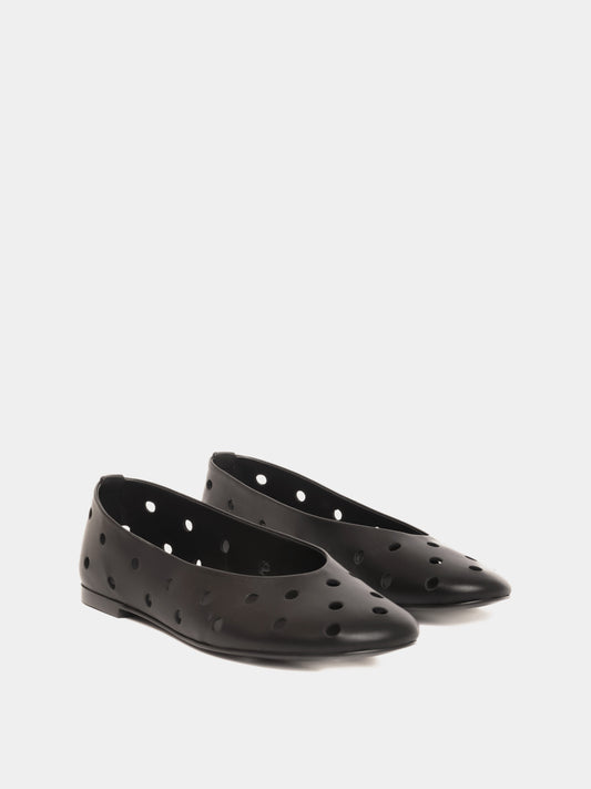 black ballet flat with round cutouts