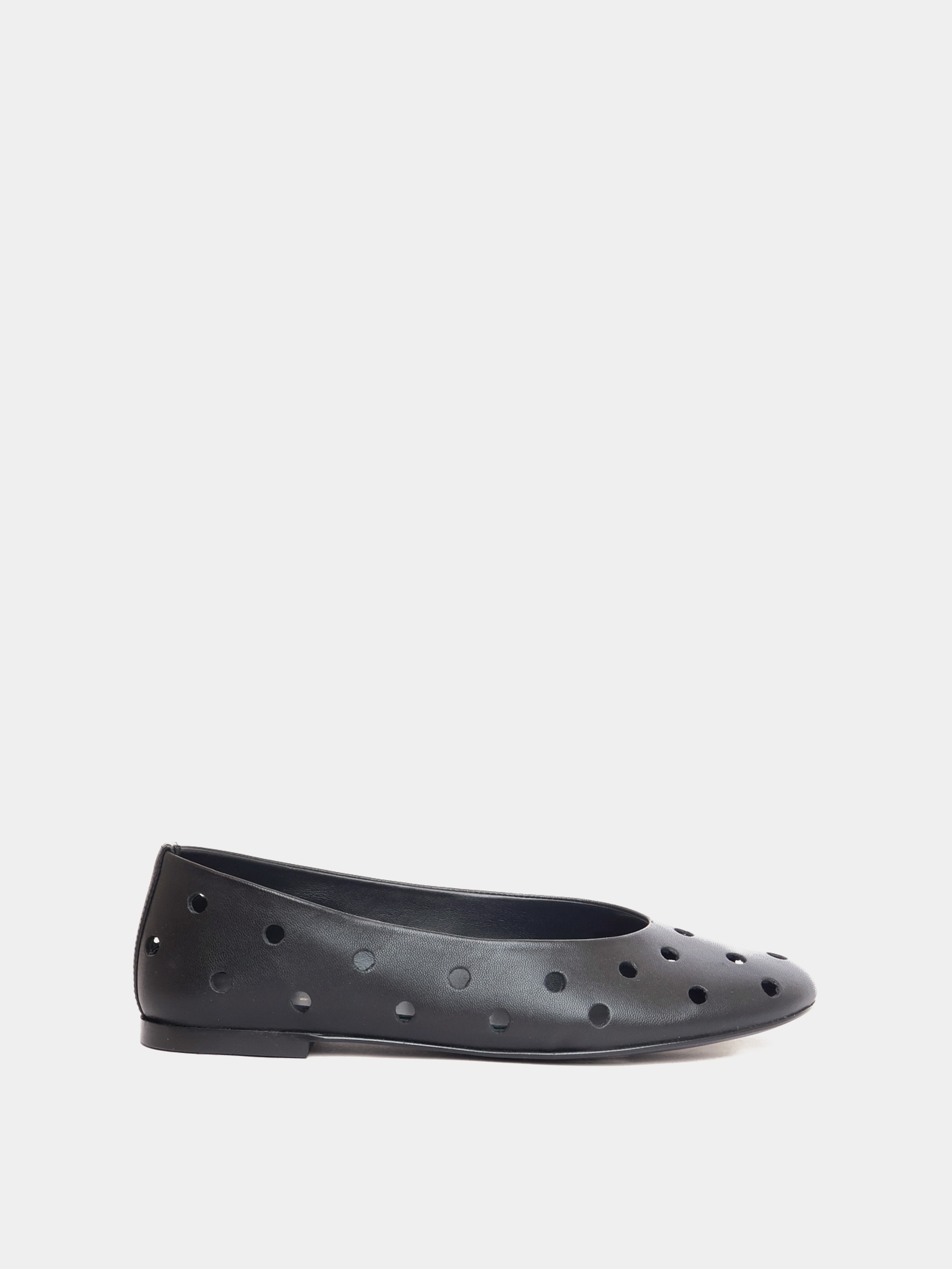 black ballet flat with round cutouts