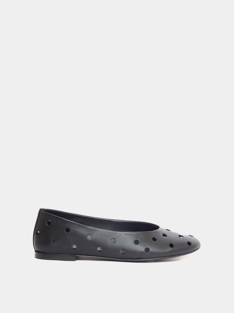 black ballet flat with round cutouts