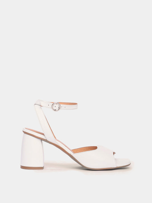 Malaga white leather heel with an asymmetric wave design and an adjustable ankle strap.