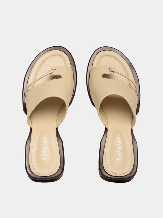 Beige leather sandals with a soft upper.