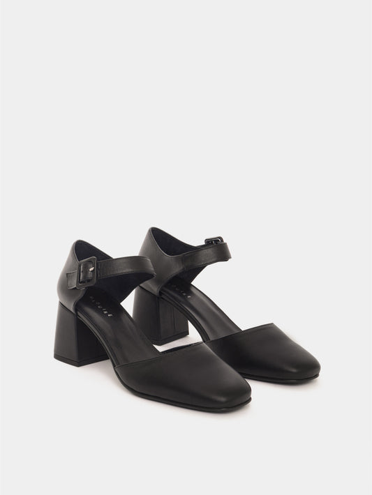 Marbella black leather Mary-Jane closed-toe block heel.