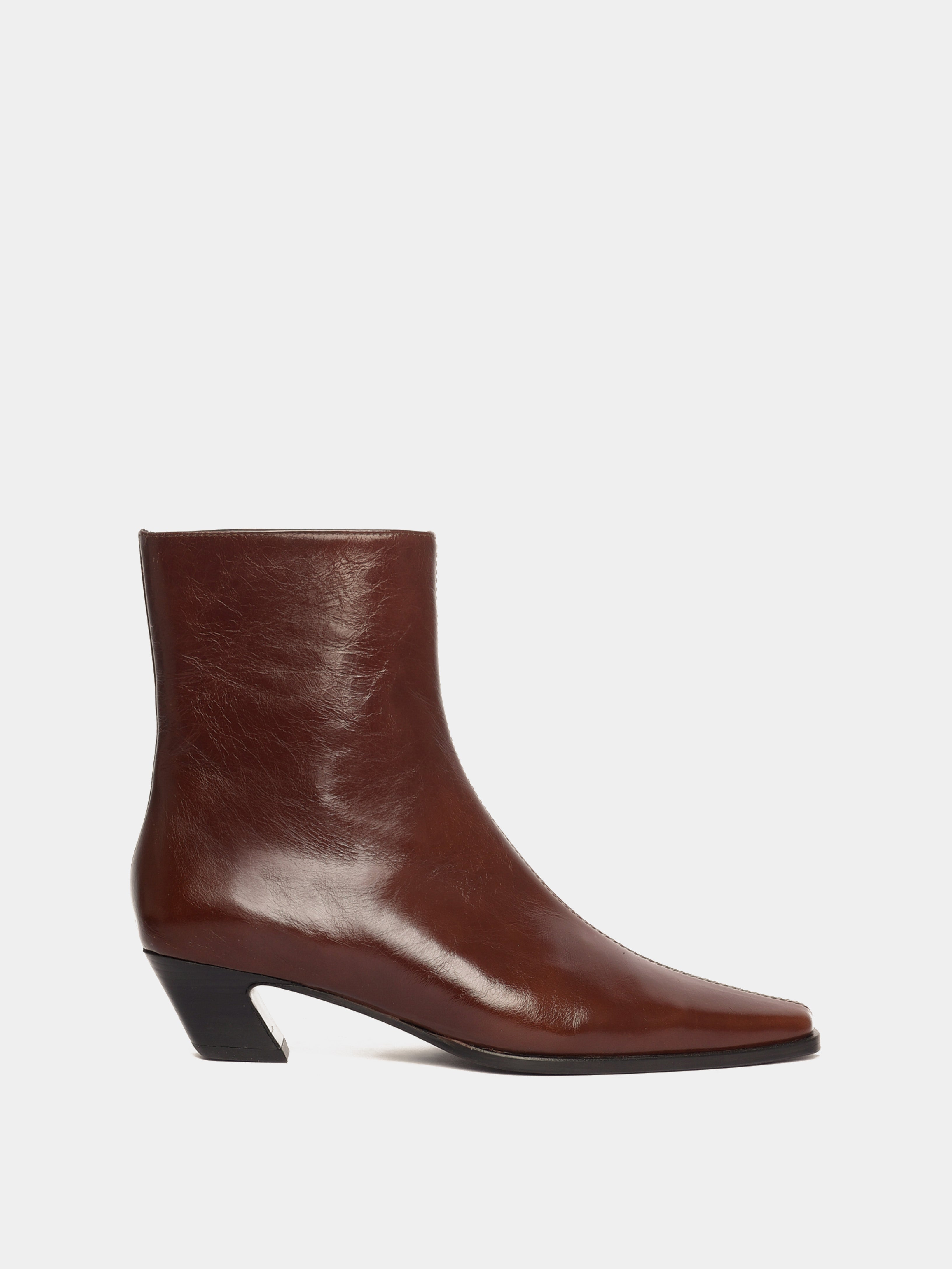 Brown leather ankle boot with a pointed toe