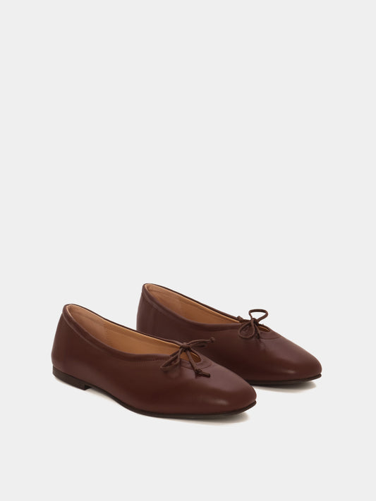 brown ballet flat with bows