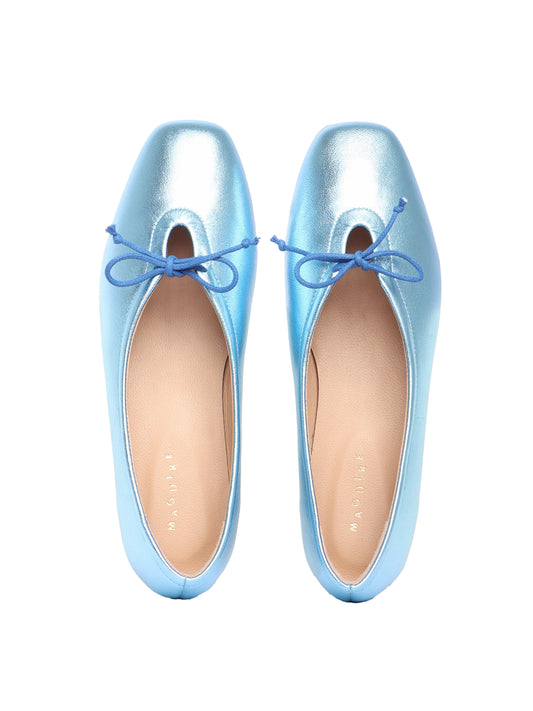 Ice blue metallic leather ballerina flats with a blue bow