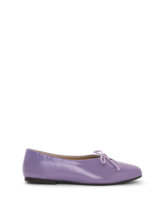 Violet patent leather ballerina flat with a lilac bow
