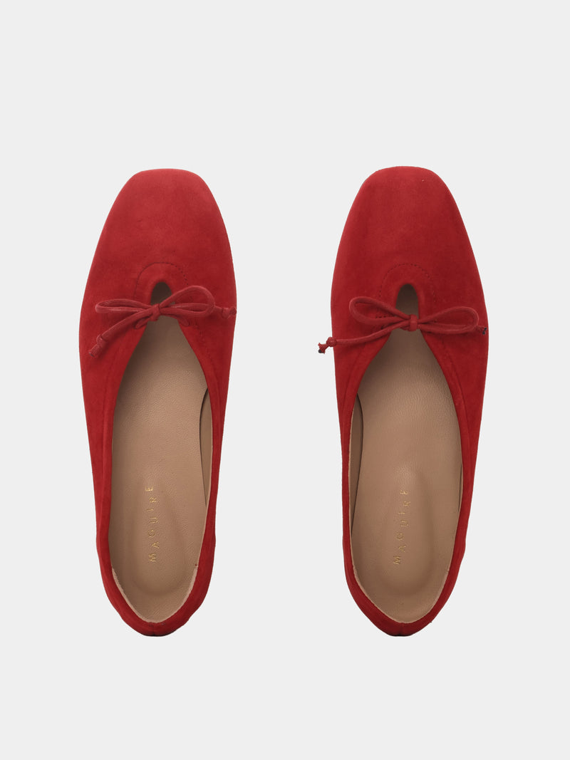 Red suede leather ballerina flats with a red bow