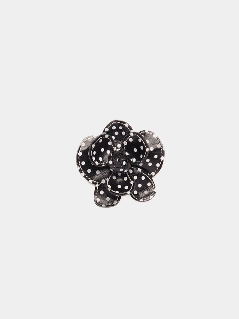 Black and white polka dot leather flower clip with white contrast stitching