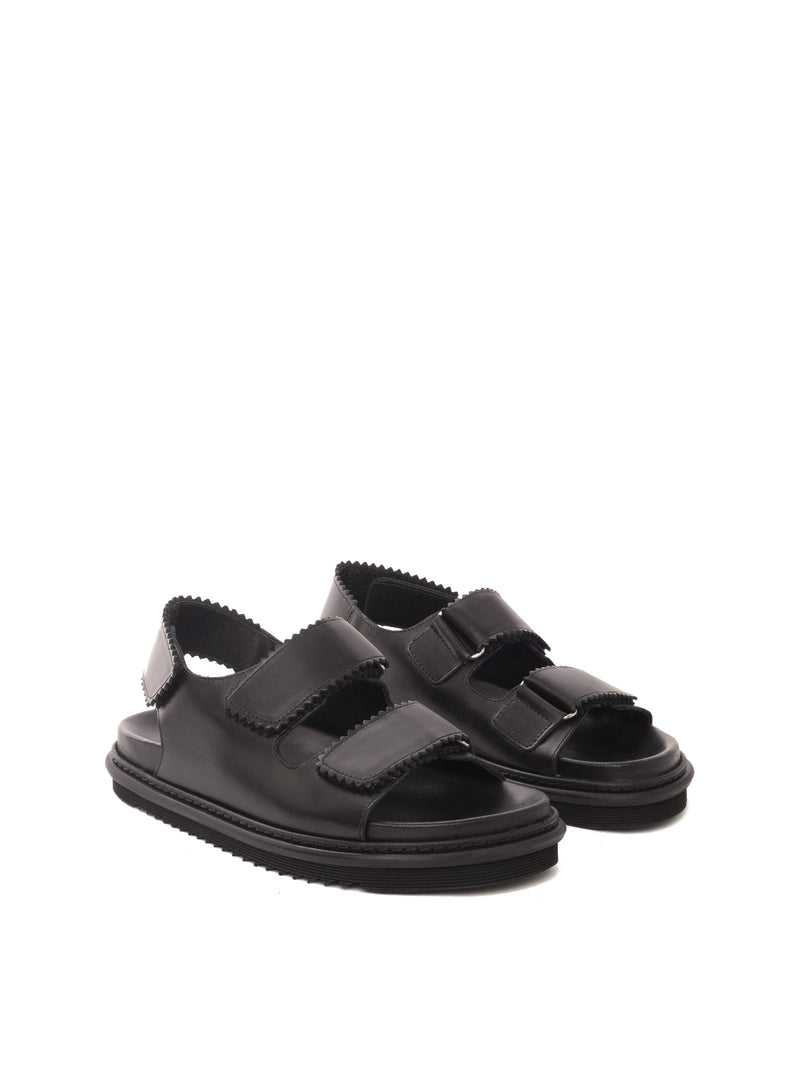 Tavira black leather sandal with two adjustable front straps and one back strap, front view.