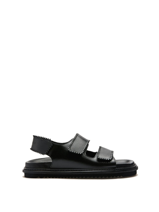 Tavira black leather sandal with two adjustable front straps and one back strap.