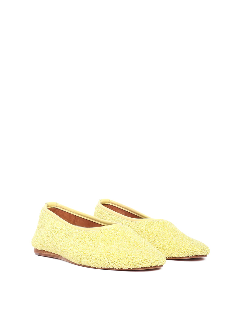 Ballerina flats made of yellow raffia