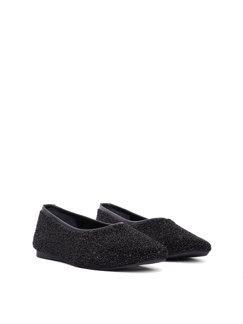 Ballerina flats made of black raffia