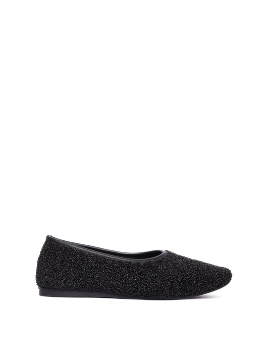 Ballerina flat made of black raffia