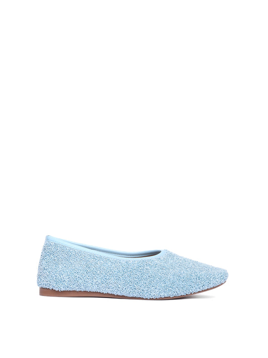 Ballerina flat made of blue raffia