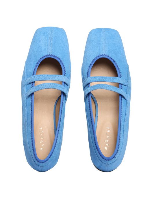 Square toe ballet flat with two elastic straps on the vamp and stitching detailing all over, in a soft blue suede.