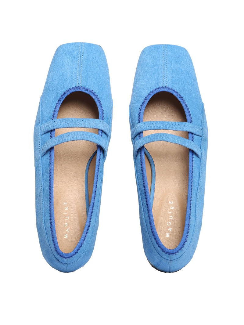 Square toe ballet flat with two elastic straps on the vamp and stitching detailing all over, in a soft blue suede.