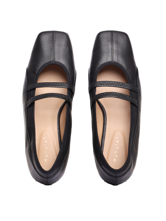Square toe ballet flat with two elastic straps on the vamp and stitching detailing all over, in a soft black leather. 