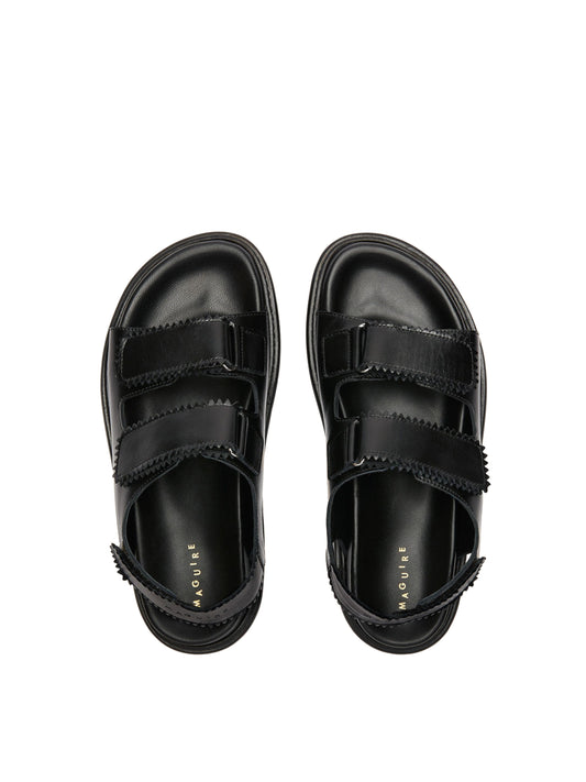 Tavira black leather sandal with two adjustable front straps and one back strap, top view.