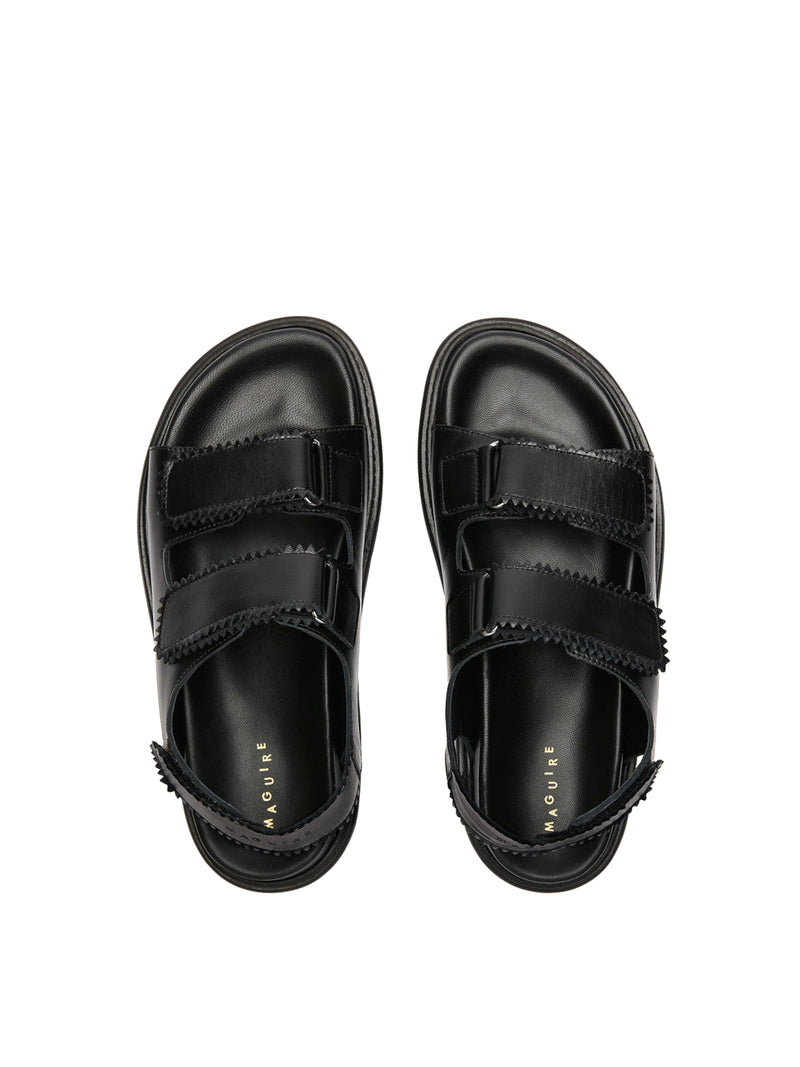 Tavira black leather sandal with two adjustable front straps and one back strap, top view.