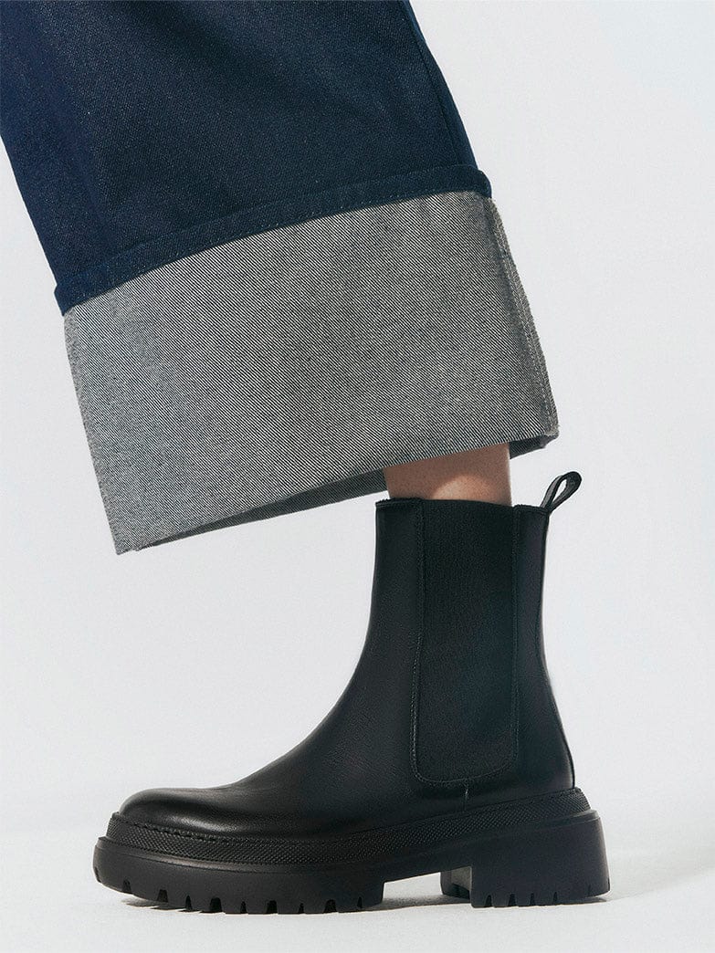 Black Chelsea Boot with a pair of jeans