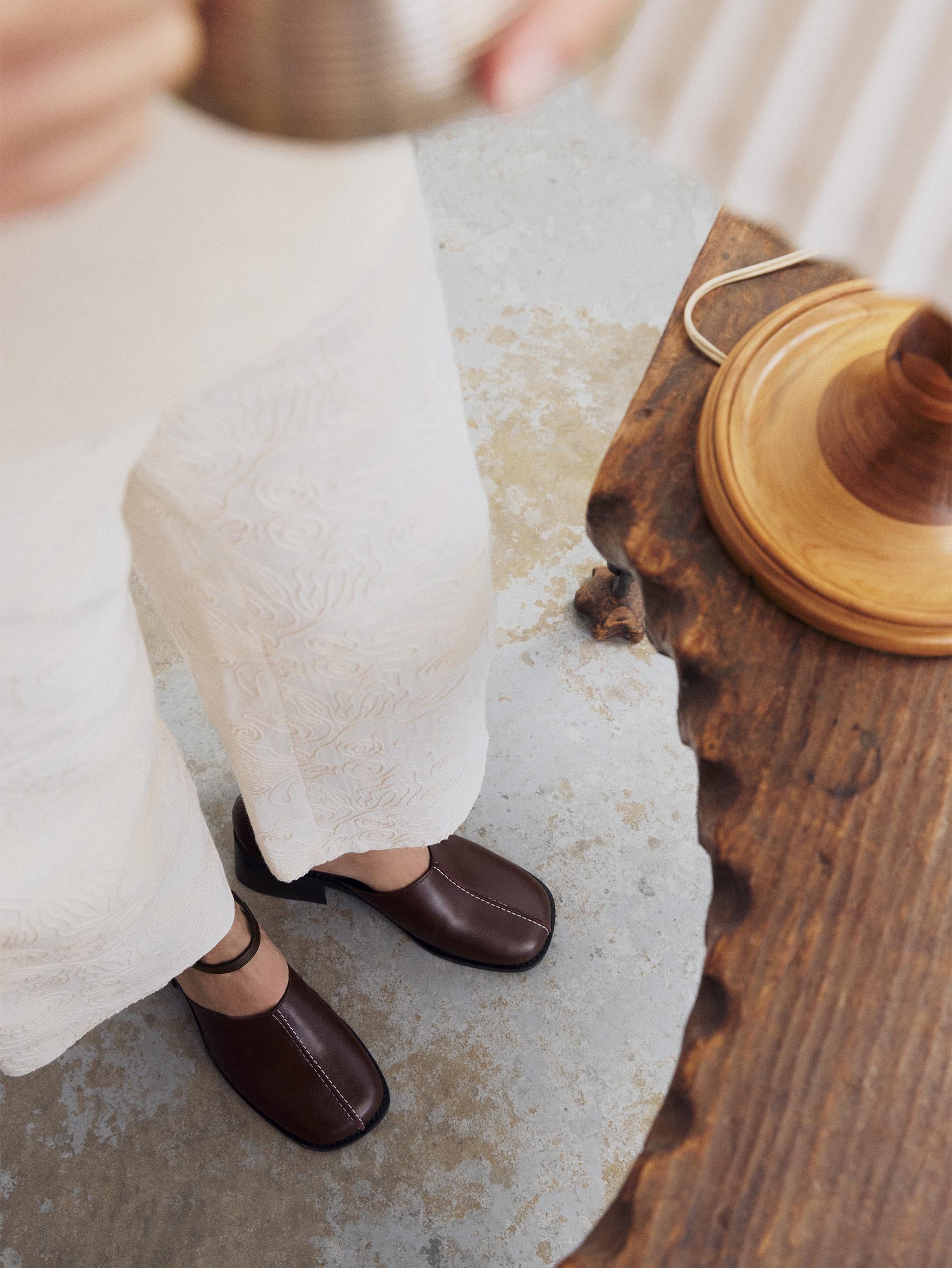 Women's brown heel worn