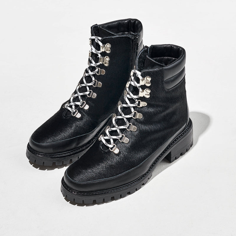 White laces on Black pony hair winter boots