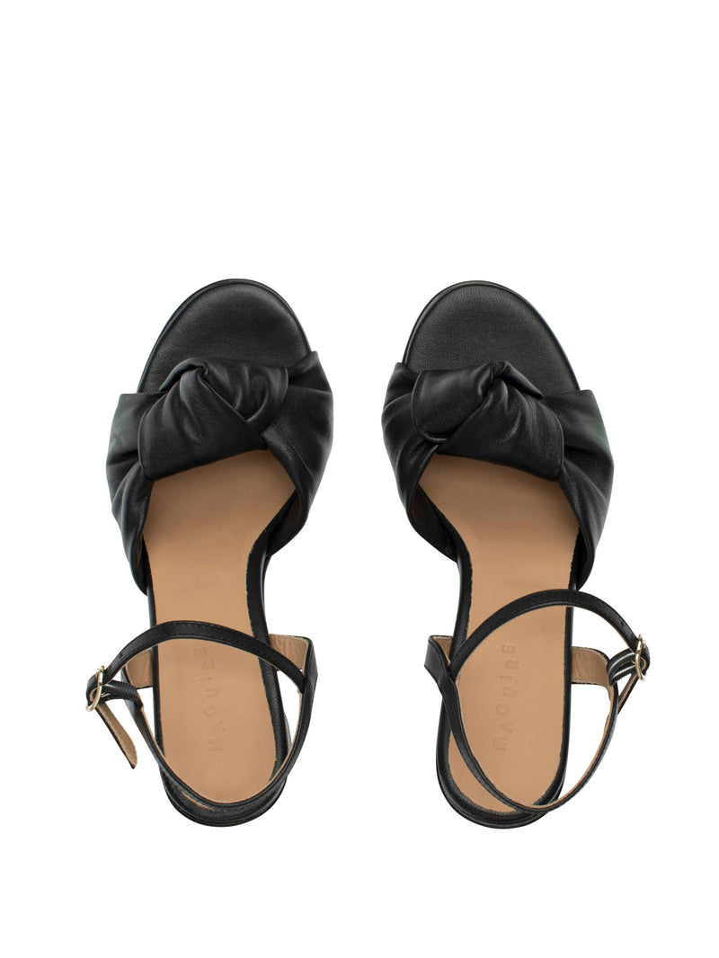 Black block heel with ankle strap and knotted upper